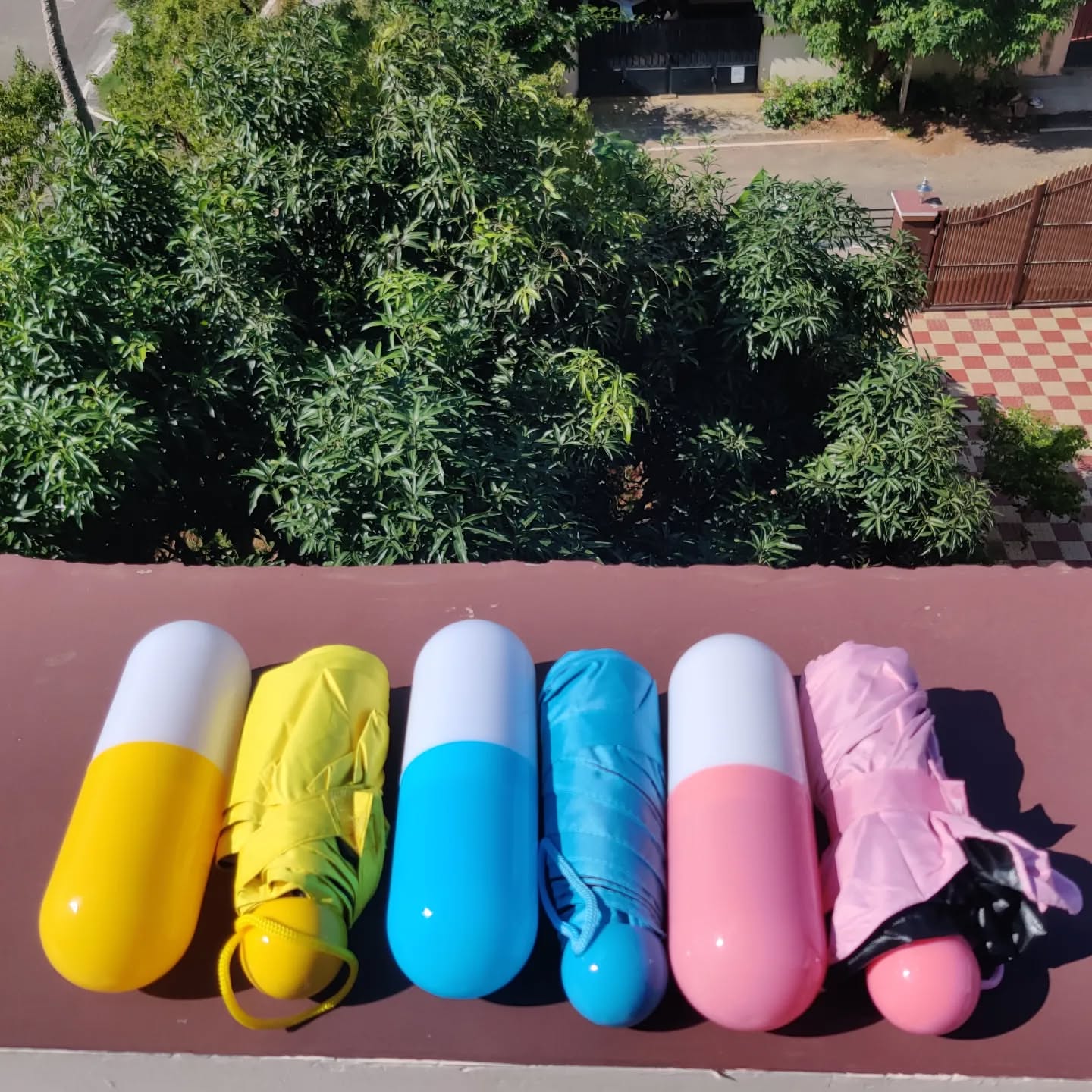 Miniature capsule umbrella's