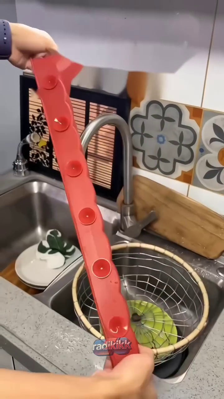 Flexible ripple splash guard installed by sink
