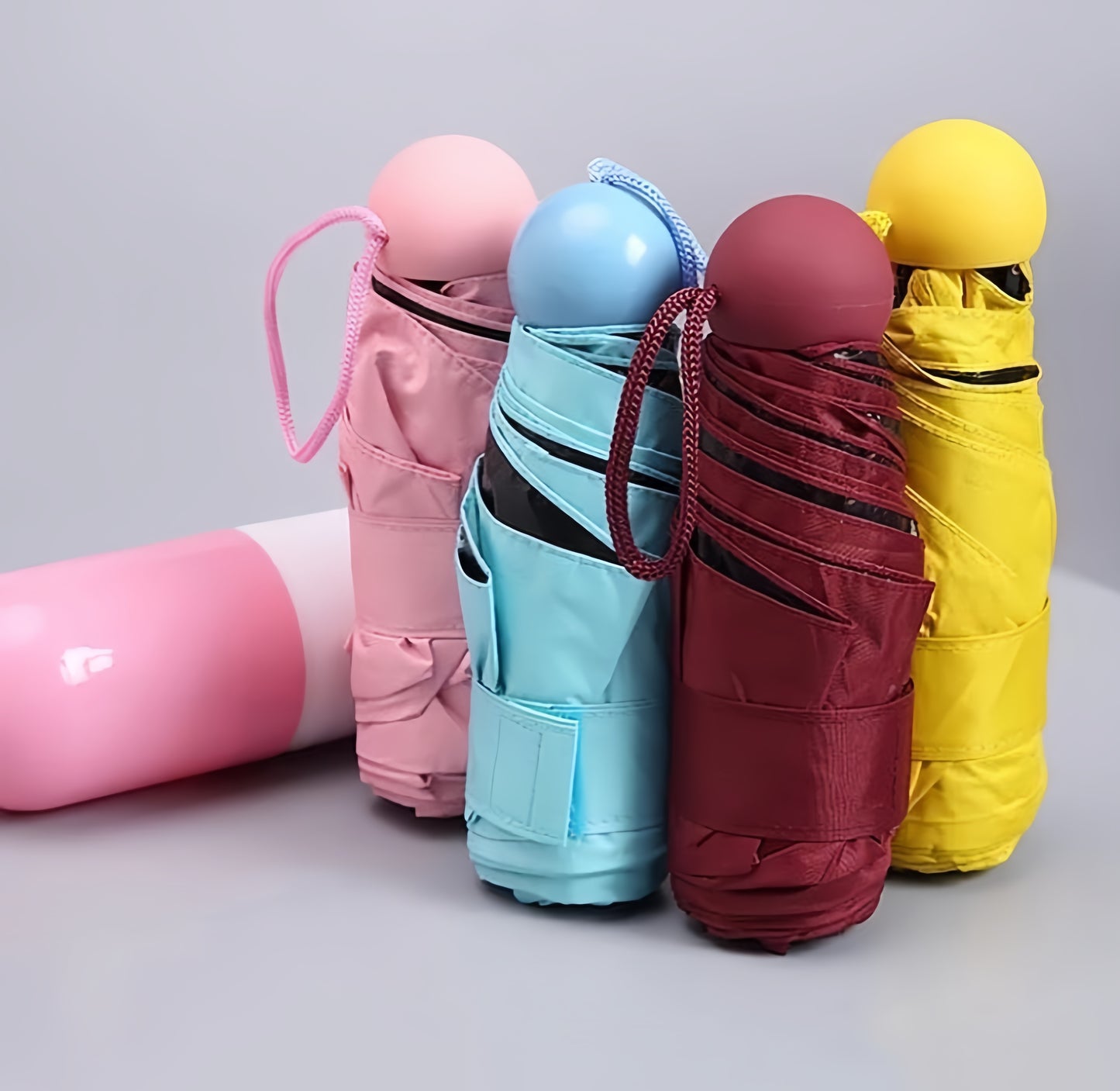 Miniature capsule umbrella's